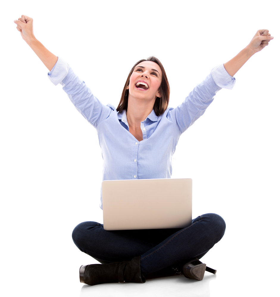 Successful woman with a laptop and arms up - isolated over white